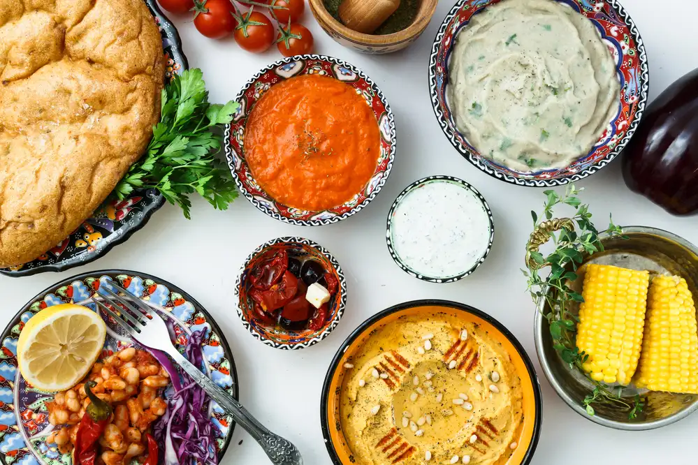 Healthy mediterranean diet advantages with fresh vegetables, fruits, olive oil, fish, nuts, and whole grains promoting heart health and wellness