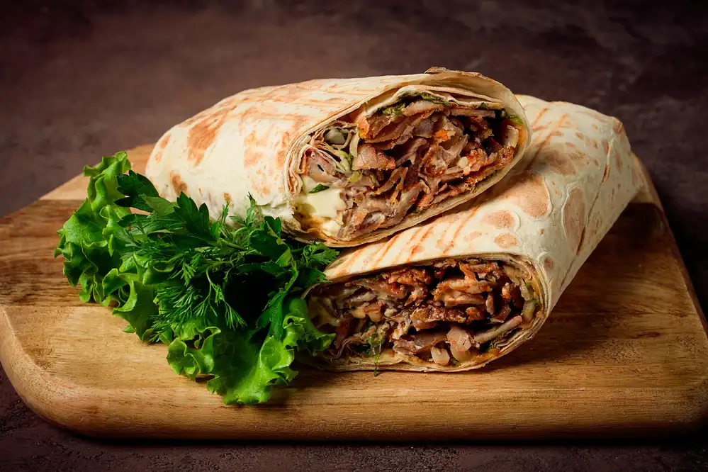 Delicious chicken shawarma served in lavash with fresh vegetables at aj greek & gyro on ledbetter dr dallas, tx, near oak cliff, cockrell hill, cedar crest, south oak cliff, kiestwood dallas, north wynnewood, and south wynnewood